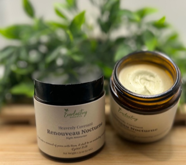 Everlasting Organics Renouveau Nocturne tallow night moisturizer open jar showing whipped cream texture with greenery background