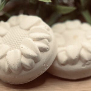 Two handmade cold process solid dish soap refill bars in sunflower mold shape, Morning Glow scent with rainbow sherbet tangelo and pink lemonade, Abiding Home collection by Everlasting Organics