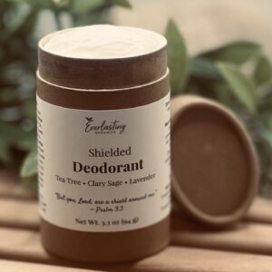Everlasting Organics Shielded natural solid deodorant essential oil blend tea tree clary sage lavender open top showing smooth creamy vegan aluminum-free formula in biodegradable push-up container